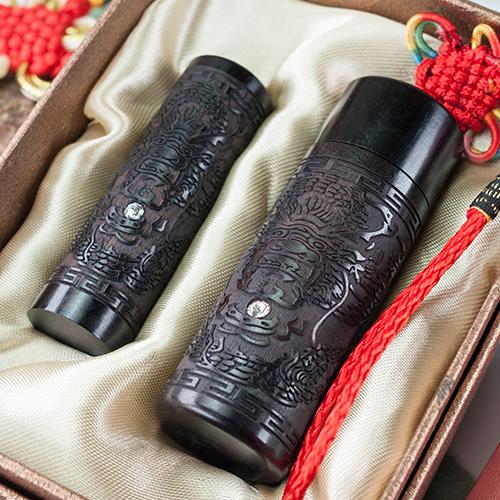 黑檀龍雕肚臍章套筒組