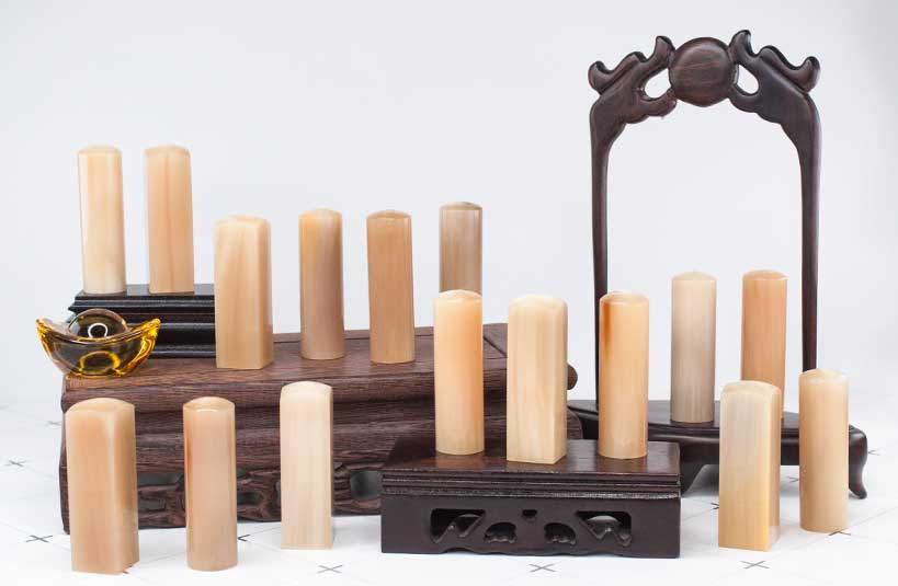 台南肚臍章 - 唯原工藝給寶貝最重要的紀念禮物，選擇台南唯原工藝肚臍章、胎毛筆，提供最多的材質、完善的服務。純天赤牛角【金沙黃】肚臍章 單章/雙章組合，買肚臍張就來唯原工藝!